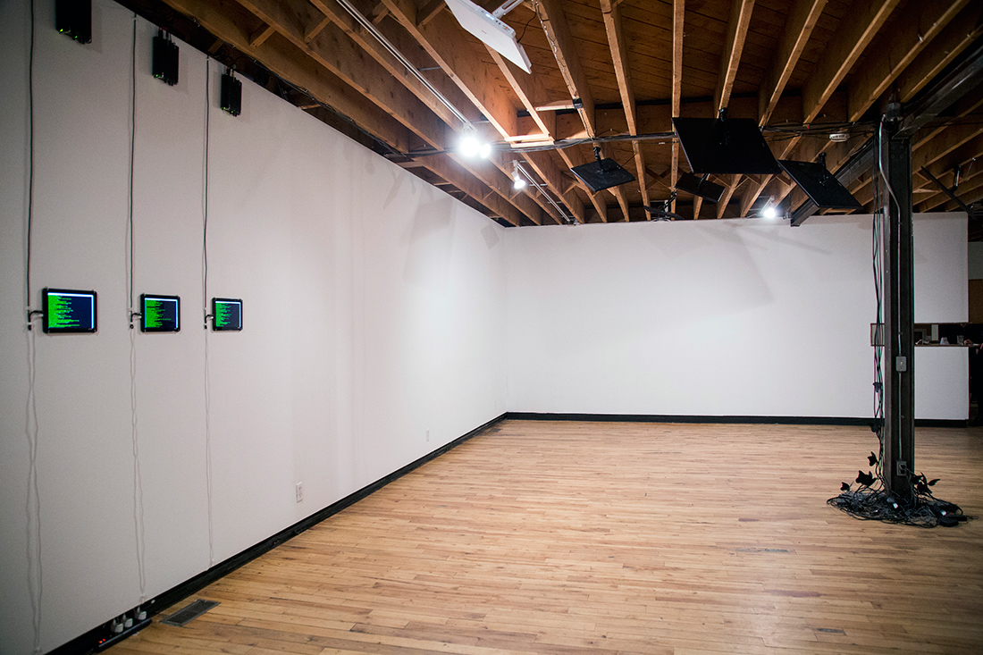 nichola feldman-kiss, still from Bread and Circuses (2015). Installation view at InterAccess.