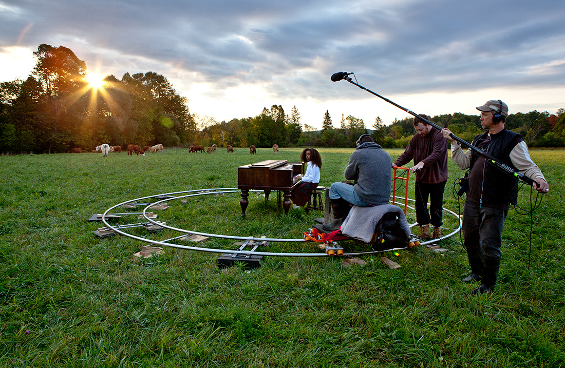 nichola feldman-kiss, after, Africa \ “So long, Farewell” (sunset) / a yard of ashes (continuous cross dissolve) / “Oh! How I hate to get up in the morning!” (sunrise) (2012). Photo of set crew.